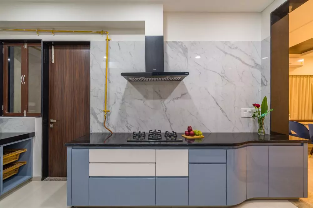 sleek Modular kitchen with blue cabinets